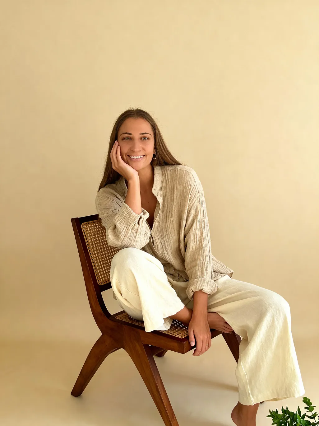 Psychologist Monique Girardo sitting on a chair